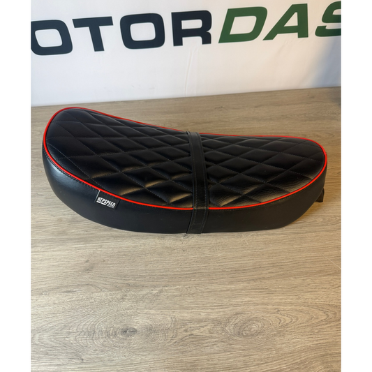 Unique Kepspeed seat for Dax 2.5- and 3.5-liter models—new model not yet released