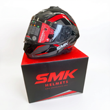 SMK Typhoon Azonix full-face helmet with flip-up sun visor.